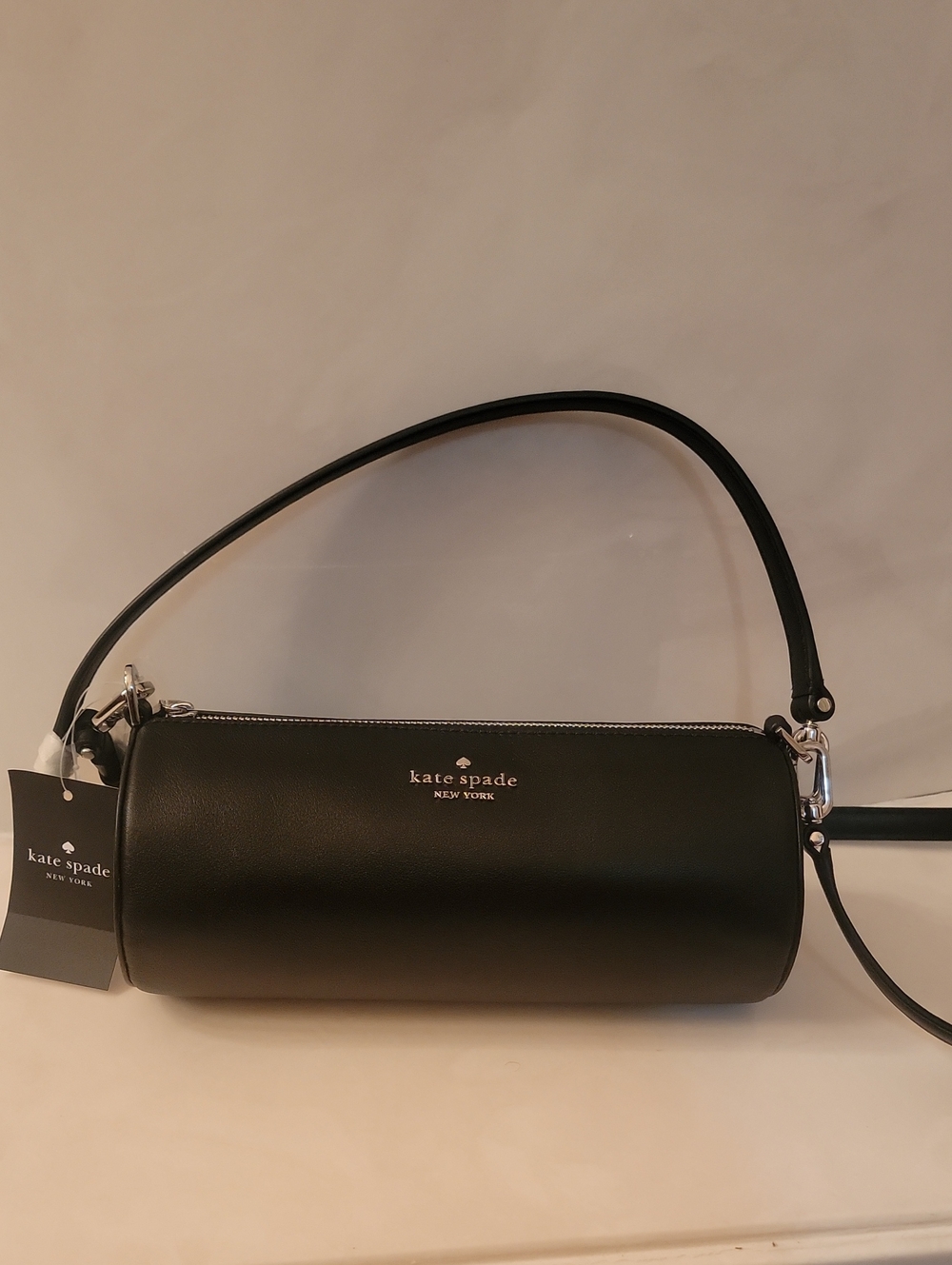 kate spade black leather mini barrel bag